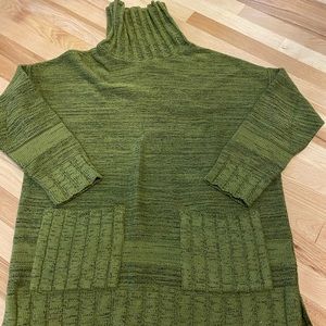 Green sweater with large patch pockets